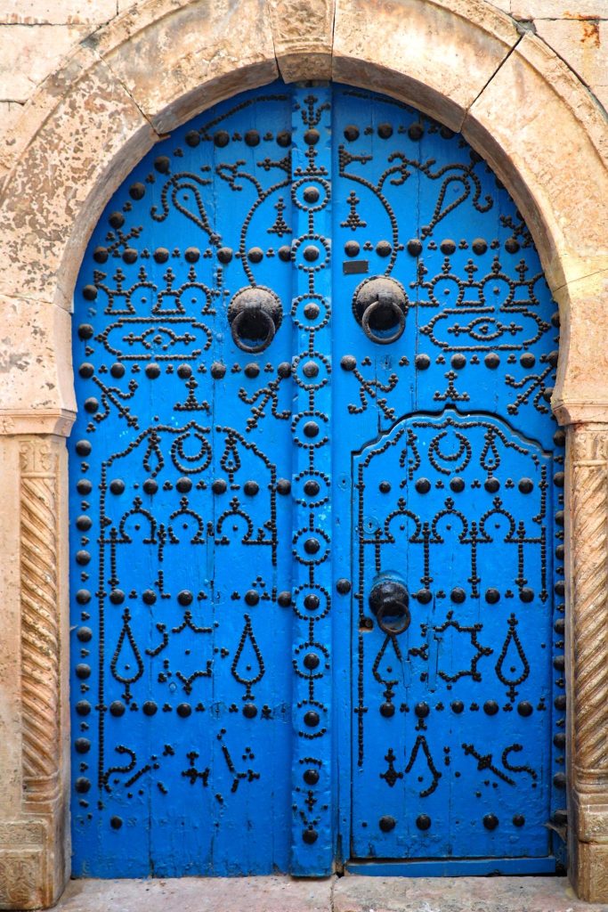 Bright blue doorways in medina of Tunis